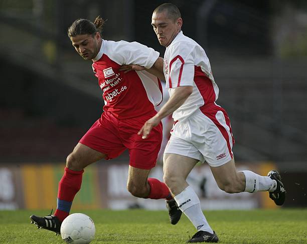 解读德甲联赛图标设计:雄狮、黑红金与足球的完美融合